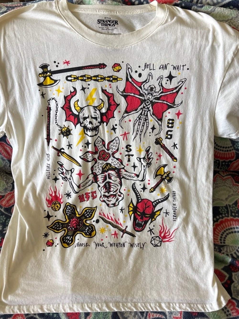 Netflix Stranger Things Graphic Tee in White with Red & Yellow Accents